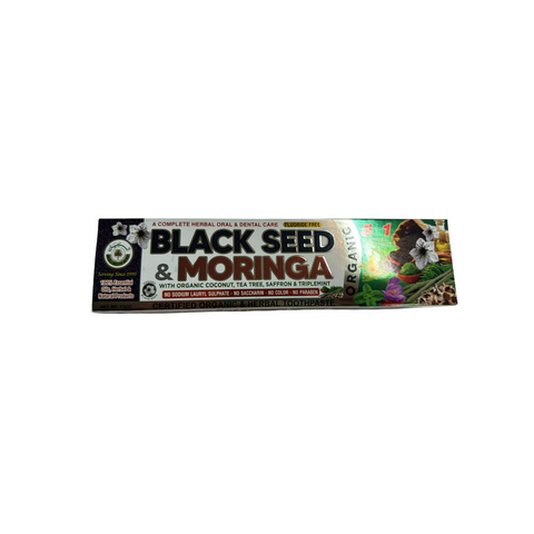 Packaging of Black Seed and Moringa toothpaste with organic coconut oil, tea tree oil, saffron, and mint. The packaging is predominantly green with text and images showcasing the product's benefits and ingredients.